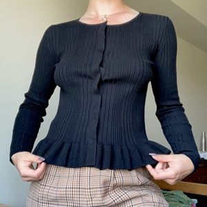 Ribbed black top with snap buttons